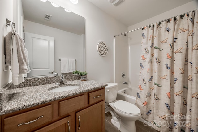 full bathroom featuring shower / tub combo, vanity, toilet, and tile patterned flooring