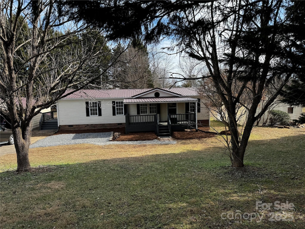 view of front facade with a porch and a front yard