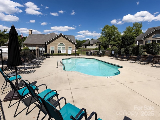 view of pool with a patio