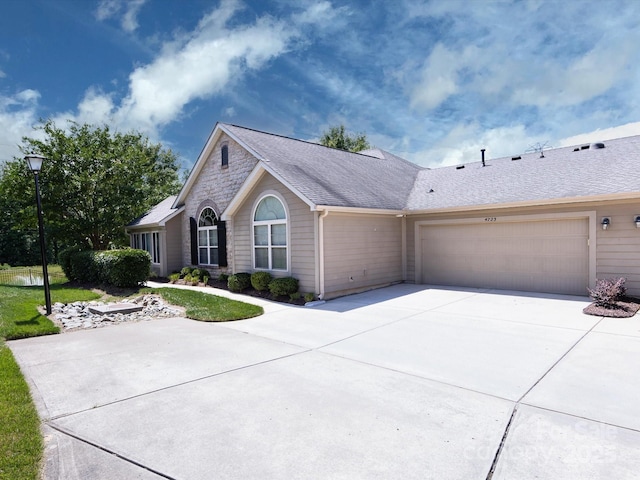 single story home featuring a garage