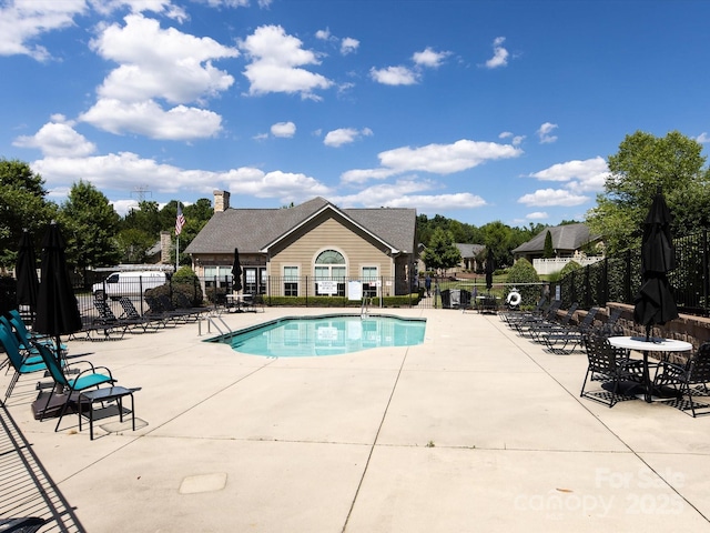 view of pool with a patio