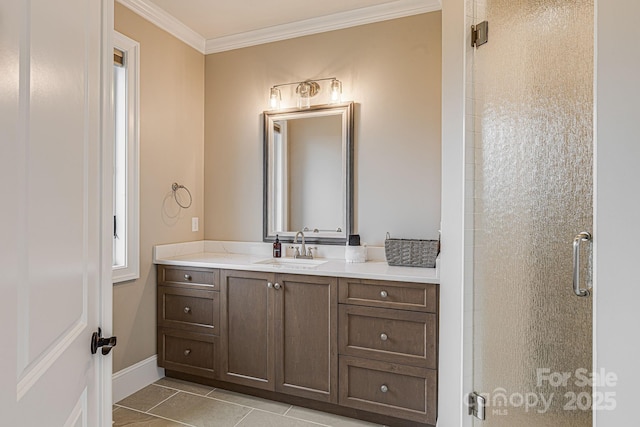 bathroom with tile patterned flooring, crown molding, vanity, and an enclosed shower