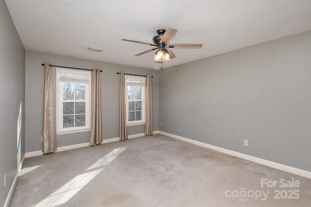 unfurnished room with ceiling fan