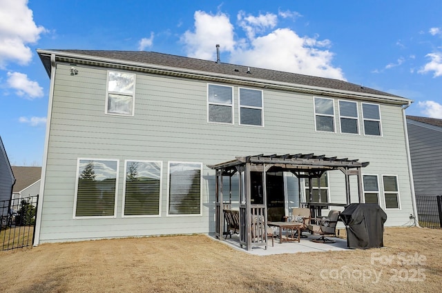 back of property with a yard, a patio, fence, and a pergola