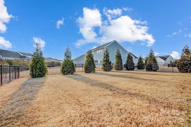 exterior space with a residential view and fence