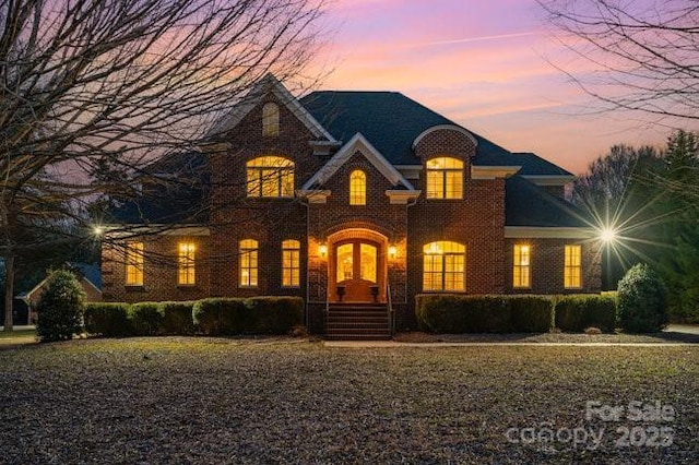 view of french country inspired facade