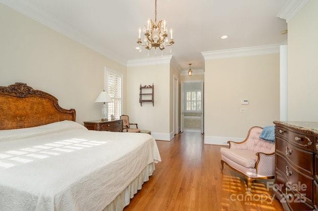 bedroom featuring crown molding and light hardwood / wood-style flooring