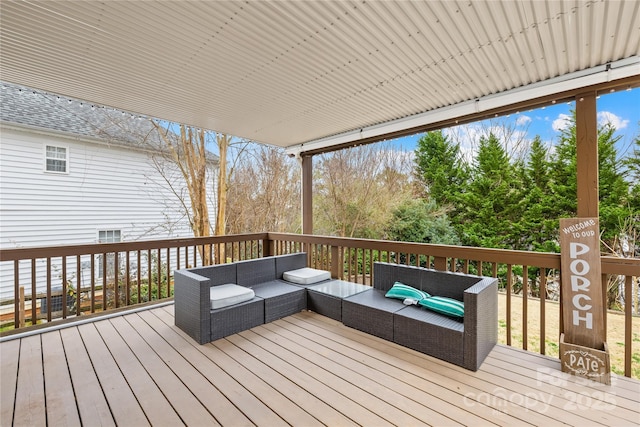 deck featuring outdoor lounge area