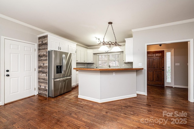 kitchen featuring white cabinetry, stainless steel fridge with ice dispenser, dark hardwood / wood-style flooring, a kitchen breakfast bar, and kitchen peninsula