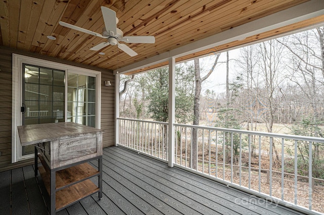 wooden terrace with ceiling fan