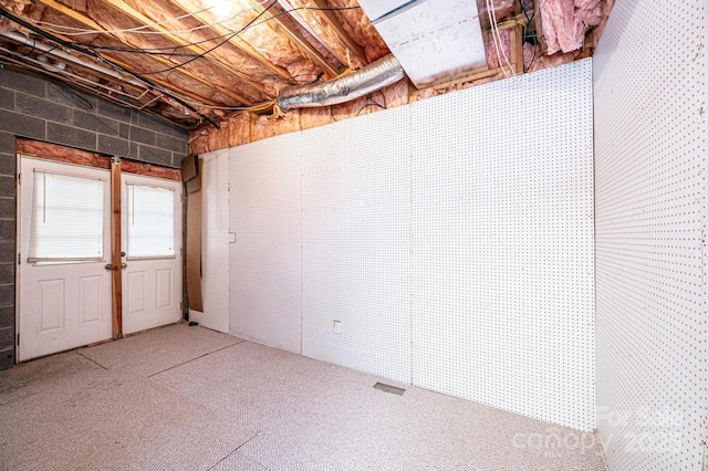 basement with carpet flooring