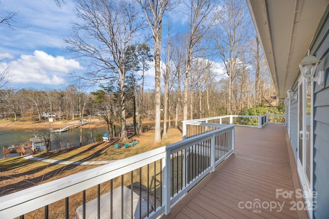 wooden terrace with a water view