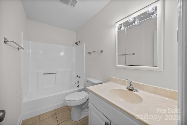 full bathroom featuring tile patterned floors, toilet, tub / shower combination, and vanity