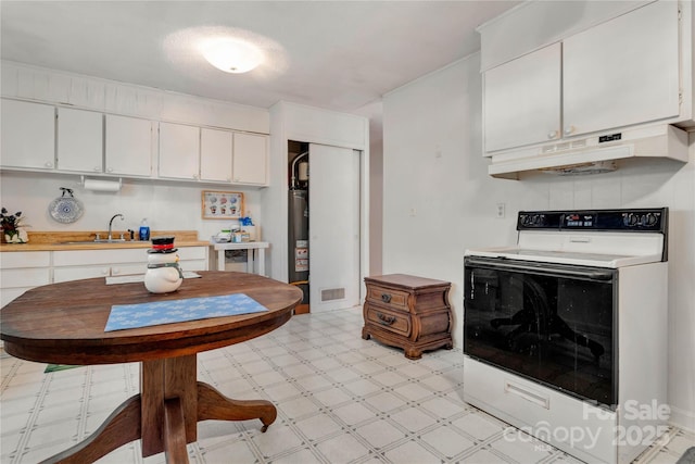 kitchen featuring white cabinetry, sink, gas water heater, and white electric range oven