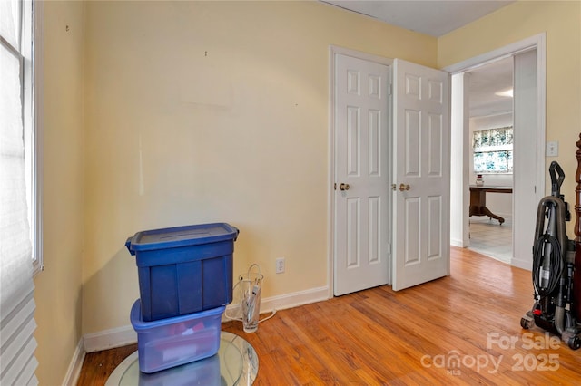 miscellaneous room with light wood-type flooring