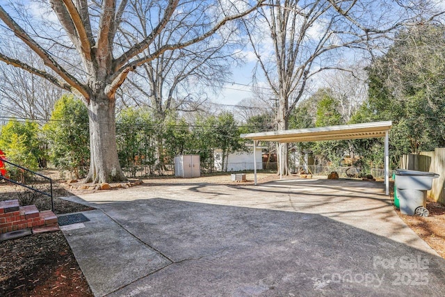 view of patio / terrace with a storage shed