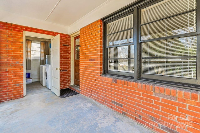 exterior space with independent washer and dryer