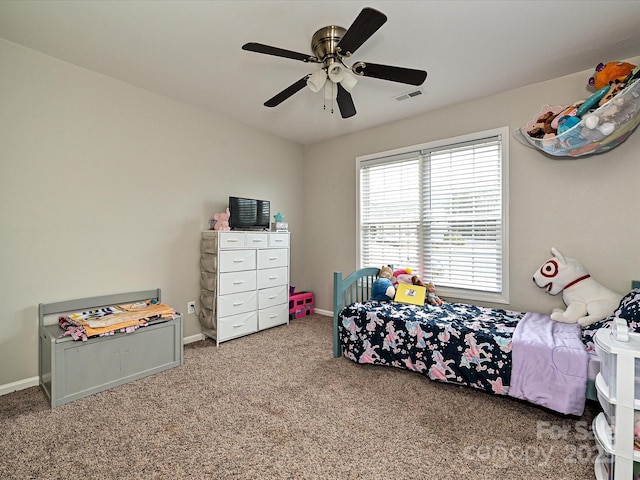 bedroom with ceiling fan and carpet