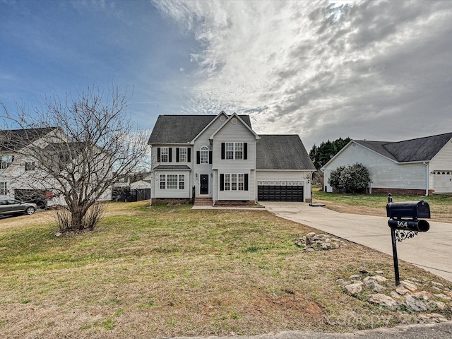 view of front of home with a garage and a front yard