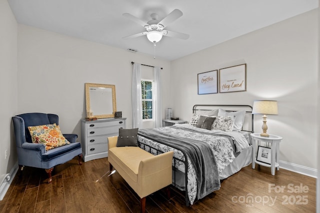 bedroom with ceiling fan and dark hardwood / wood-style floors