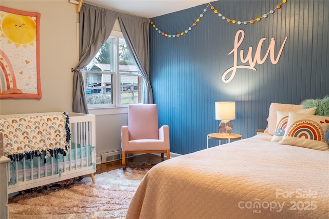 bedroom featuring wood-type flooring