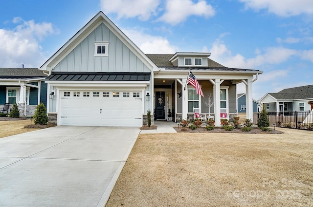 craftsman inspired home with a porch, a garage, and a front yard