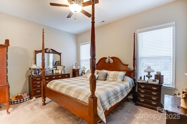 carpeted bedroom with ceiling fan