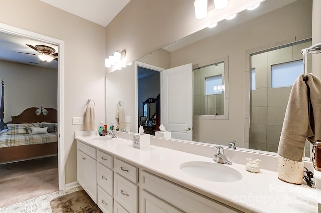 bathroom with ceiling fan and vanity