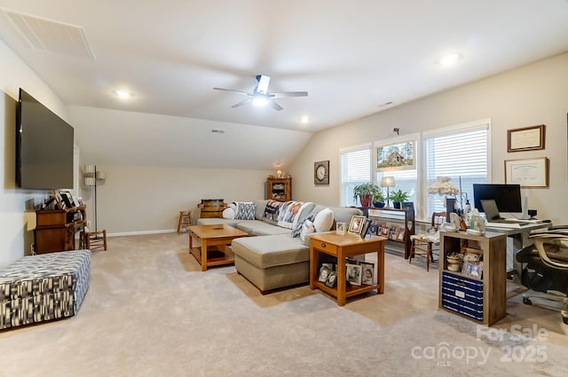 living room featuring ceiling fan, light carpet, and lofted ceiling