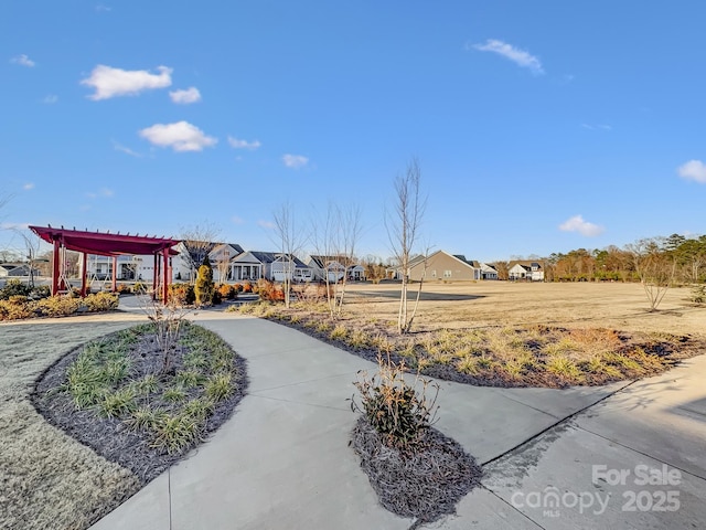 surrounding community with a pergola