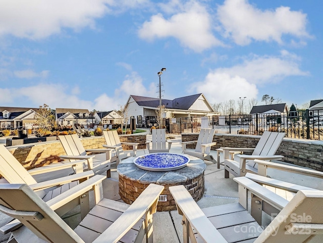 view of patio with a fire pit