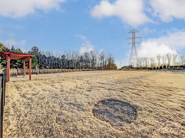 view of yard with a rural view