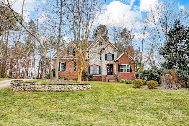 view of front of home featuring a front yard