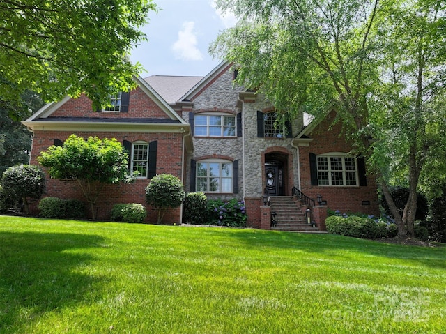 252 Bay Shore Loop, Mooresville, NC 28117 - view of front of home with a front lawn, stone siding, and brick siding