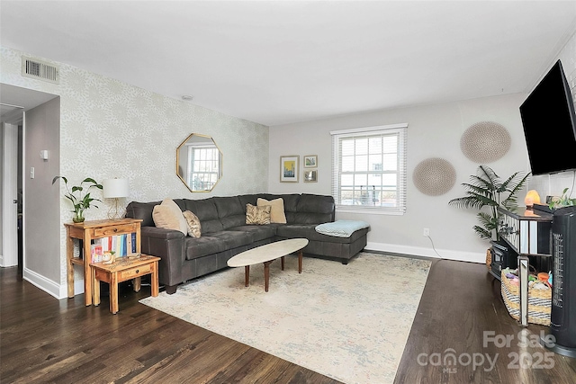 living room featuring dark wood-type flooring