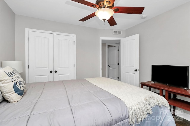 bedroom featuring a closet and ceiling fan