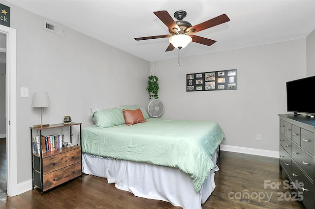 bedroom featuring dark wood-type flooring and ceiling fan