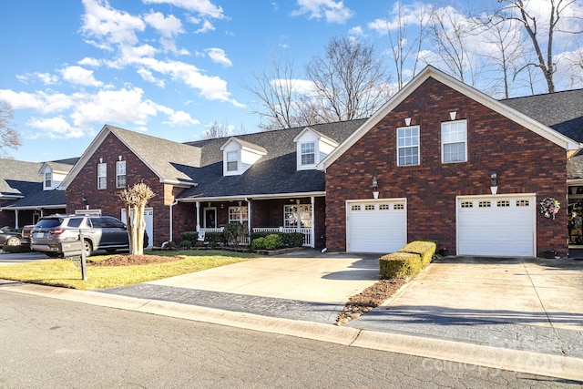 view of front of property with a garage and a porch