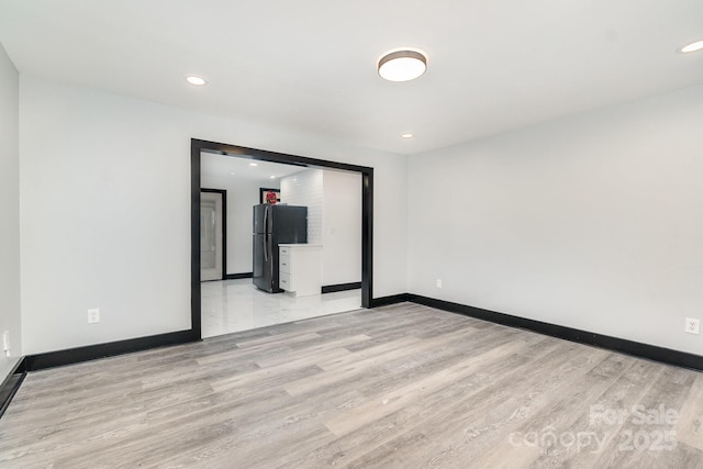 empty room featuring light hardwood / wood-style flooring