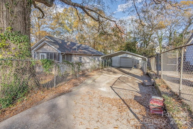 ranch-style home featuring a carport