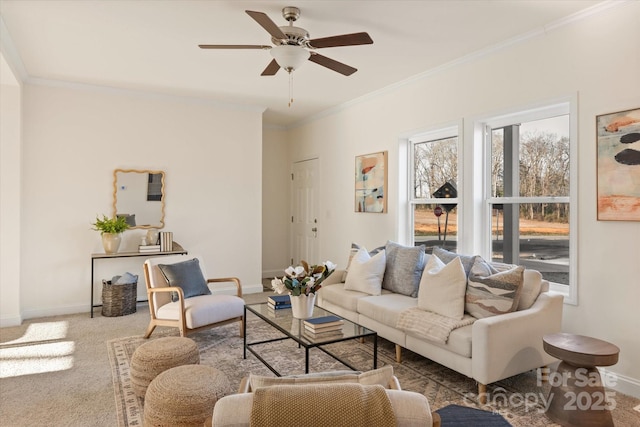 living area featuring baseboards, carpet, and ornamental molding