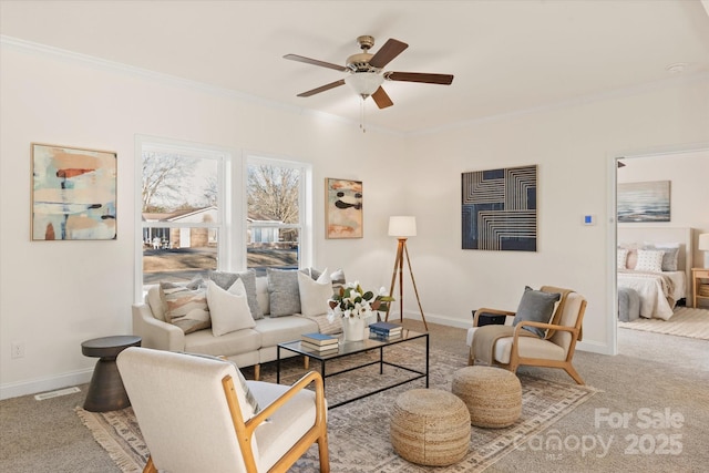 carpeted living room featuring visible vents, a ceiling fan, crown molding, and baseboards