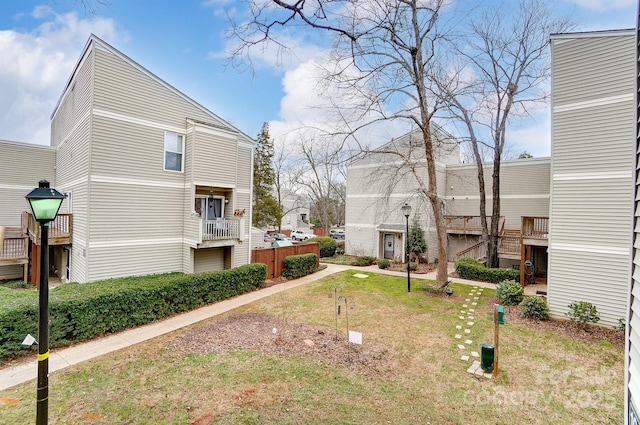 view of property exterior featuring a lawn