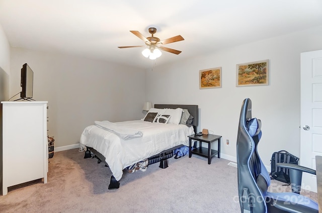 bedroom featuring ceiling fan and light colored carpet