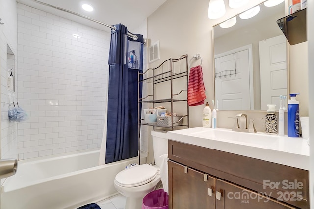 full bathroom with vanity, toilet, and shower / bath combo