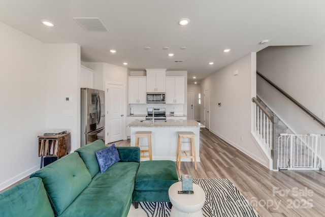 living room with light wood-type flooring