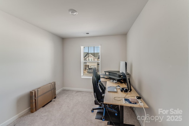 office featuring light colored carpet