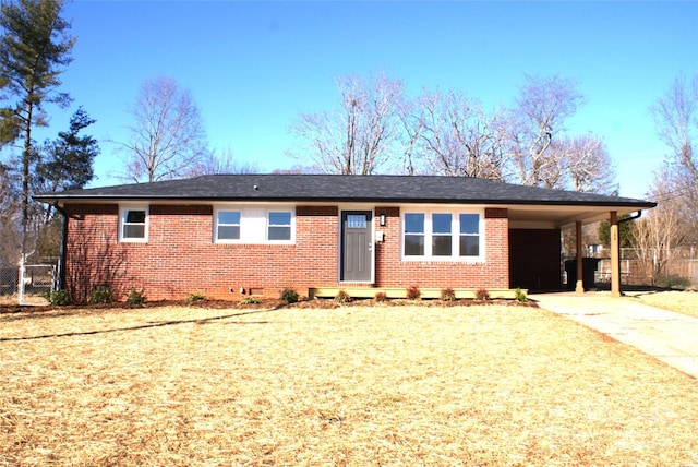 ranch-style home with a carport