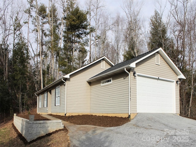 view of home's exterior featuring a garage