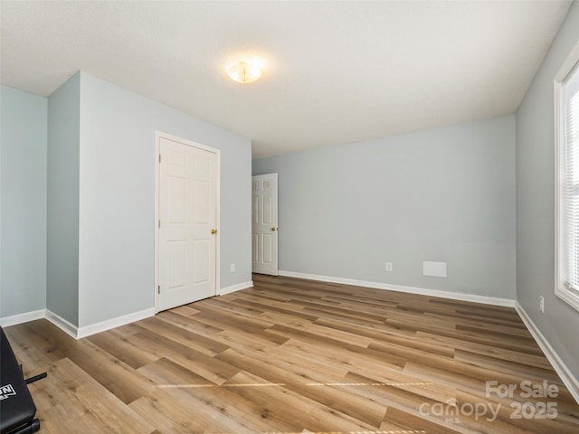 empty room featuring light wood-type flooring